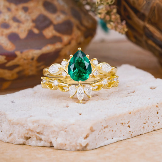 6 Prong Romantic Vine Themed Pear Cut Emerald Rings