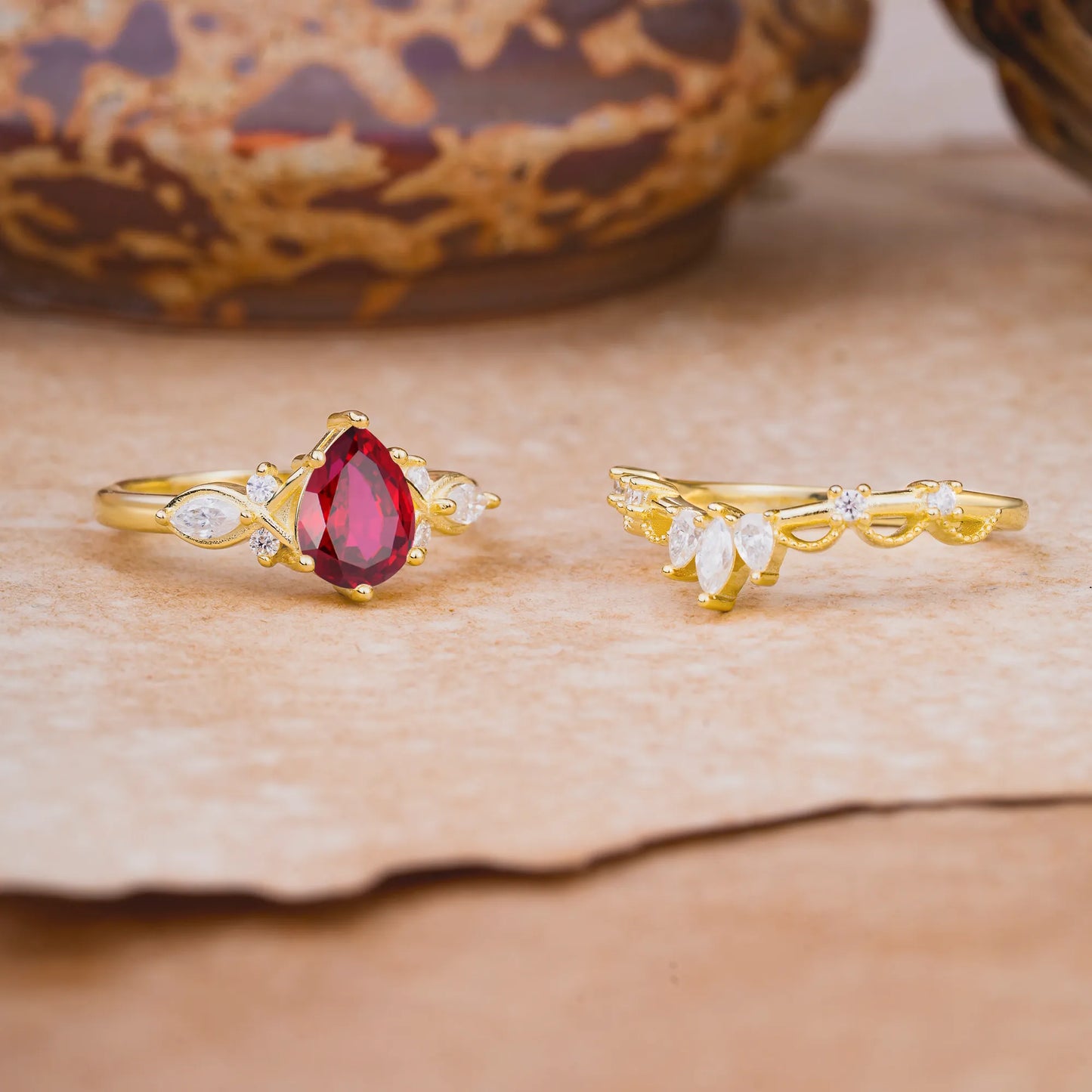 6 Prong Romantic Vine Themed Pear Cut Ruby Rings