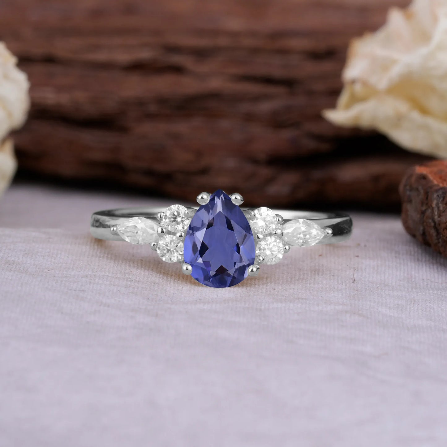 Sophisticated 4-Prong Pear-Cut Tanzanite Promise Ring