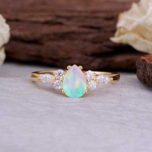 Sophisticated 4-Prong Pear-Cut Fire Opal Engagement Ring