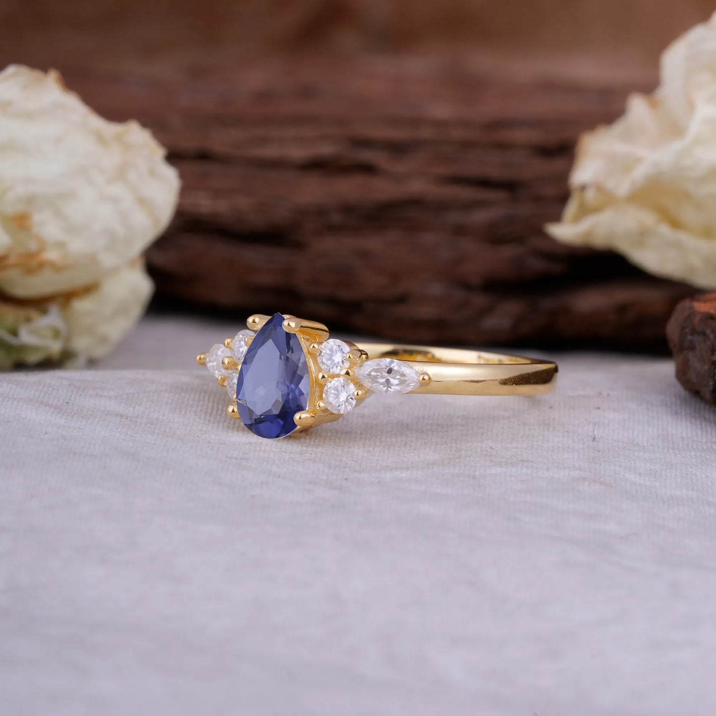 Sophisticated 4-Prong Pear-Cut Tanzanite Promise Ring