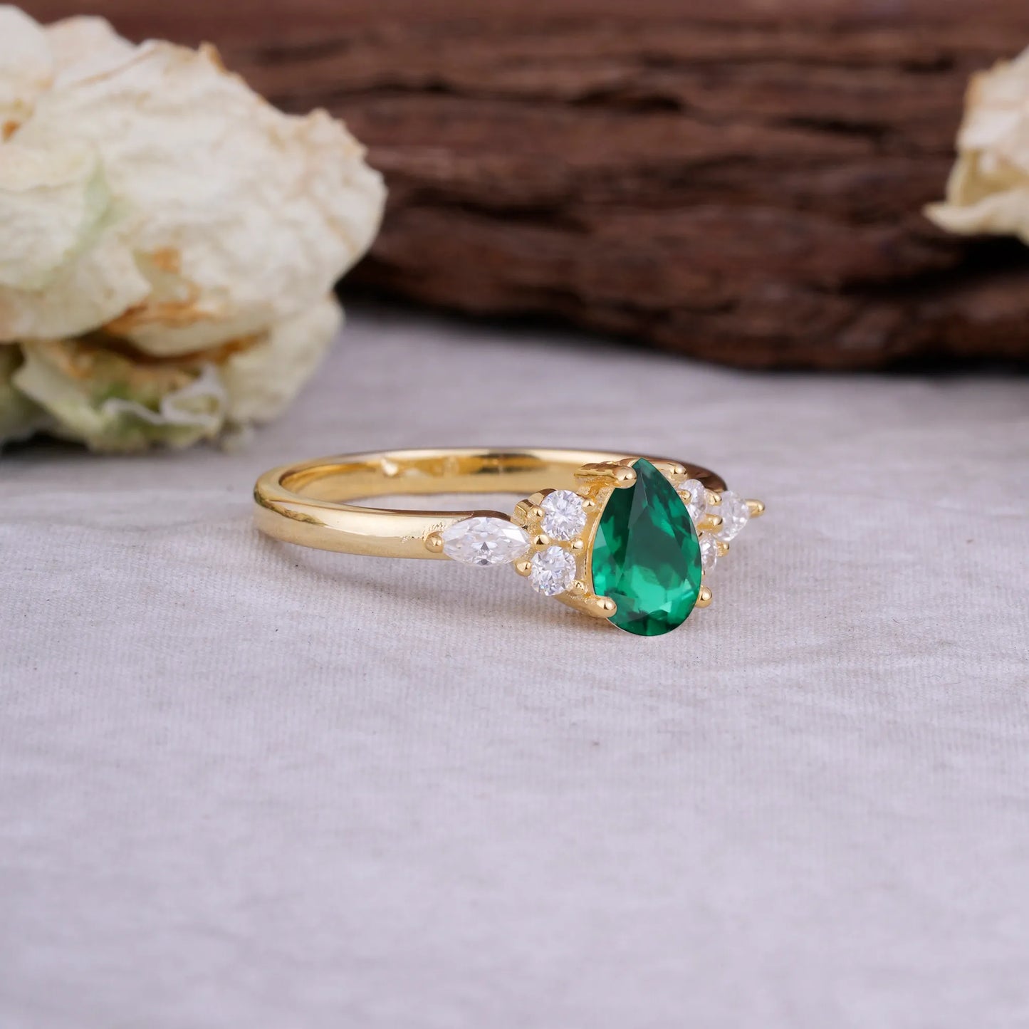 Sophisticated 4-Prong Pear-Cut Emerald Promise Ring