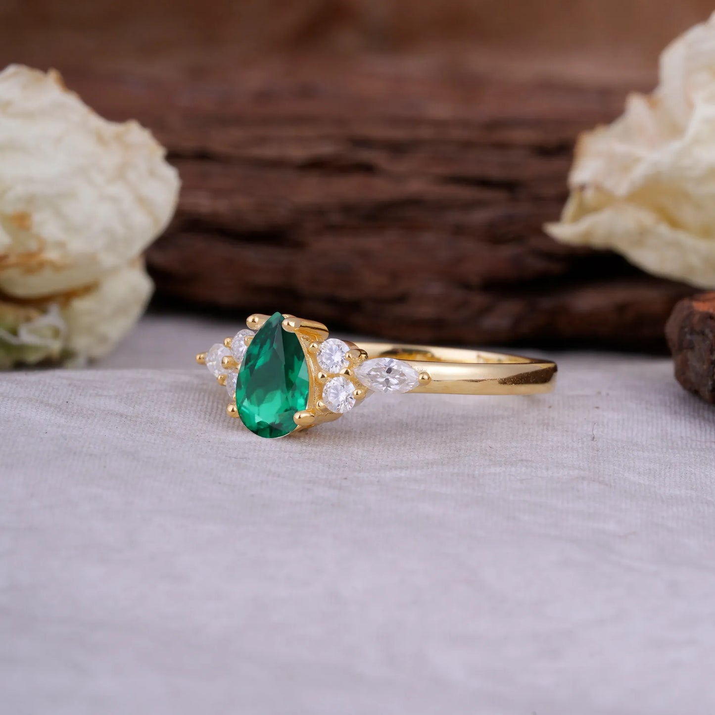 Sophisticated 4-Prong Pear-Cut Emerald Promise Ring