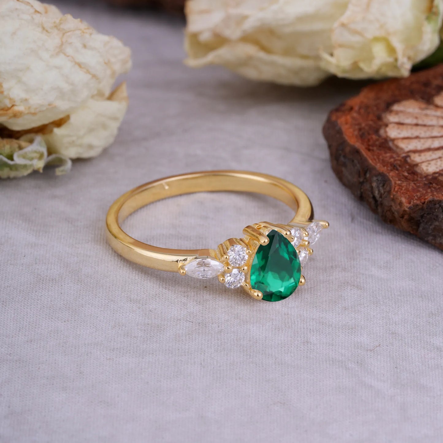 Sophisticated 4-Prong Pear-Cut Emerald Promise Ring