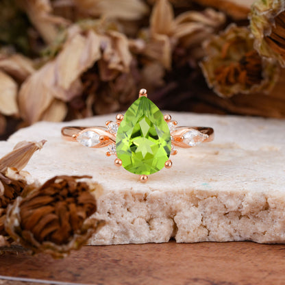 Vintage Pear Cut Peridot Three Side Stone Engagement Ring with Accents
