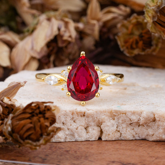 Vintage Pear Cut Ruby Three Side Stone Engagement Ring with Accents