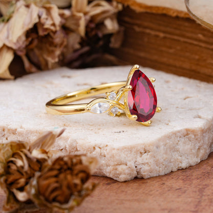 Vintage Pear Cut Ruby Three Side Stone Engagement Ring with Accents