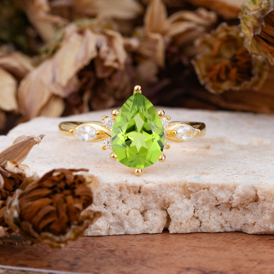 Vintage Pear Cut Peridot Three Side Stone Engagement Ring with Accents