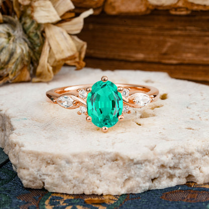 Nature Inspired 6 Prong Leaf Oval Cut Emerald Engagement Ring