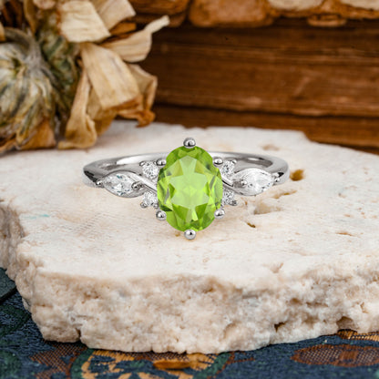 Nature Inspired 6 Prong Leaf Oval Cut Peridot Engagement Ring