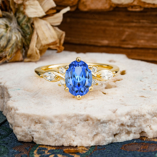 Nature Inspired 6 Prong Leaf Oval Cut Sapphire Engagement Ring