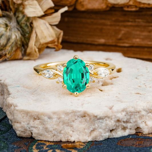 Nature Inspired 6 Prong Leaf Oval Cut Emerald Engagement Ring