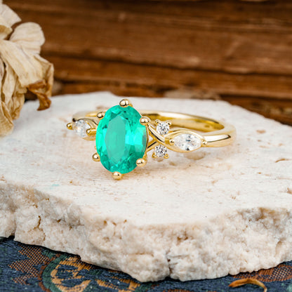 Nature Inspired 6 Prong Leaf Oval Cut Emerald Engagement Ring