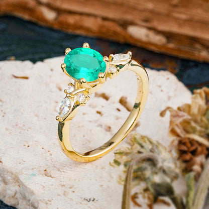 Nature Inspired 6 Prong Leaf Oval Cut Emerald Engagement Ring
