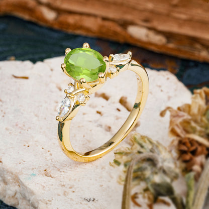 Nature Inspired 6 Prong Leaf Oval Cut Peridot Engagement Ring