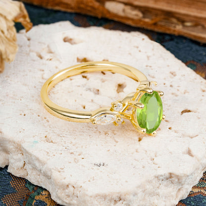 Nature Inspired 6 Prong Leaf Oval Cut Peridot Engagement Ring