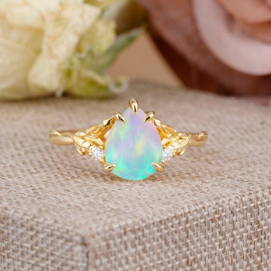 Elegant & Luxurious 5 prong Pear-Cut Fire Opal Engagement Ring