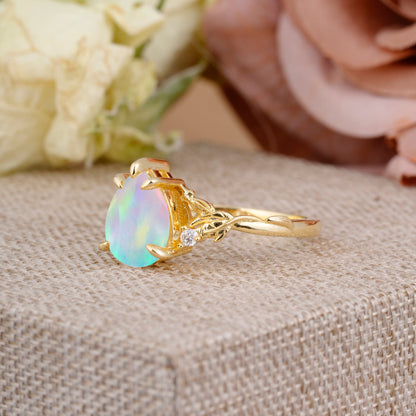 Elegant & Luxurious 5 prong Pear-Cut Fire Opal Engagement Ring