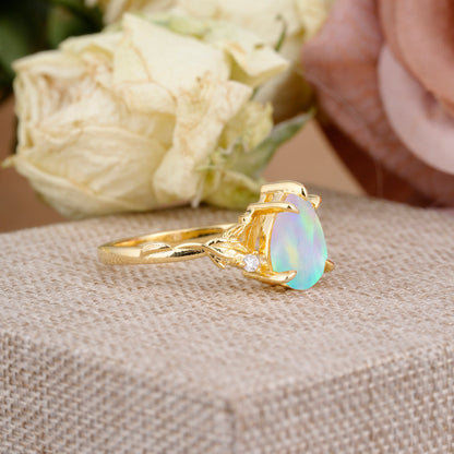 Elegant & Luxurious 5 prong Pear-Cut Fire Opal Engagement Ring