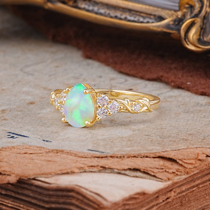 Nature-Inspired Vintage 4-Prong Pear Cut Opal Engagement Ring