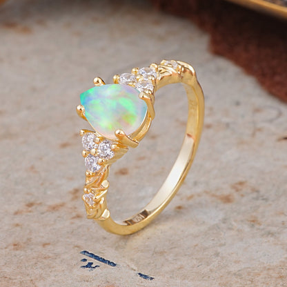 Nature-Inspired Vintage 4-Prong Pear Cut Opal Engagement Ring