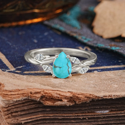 Exquisite 4-Prong Pear Cut Turquoise Engagement Ring
