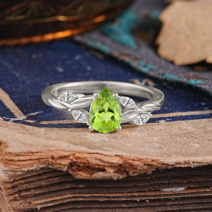 Exquisite 4-Prong Pear Cut Peridot Engagement Ring