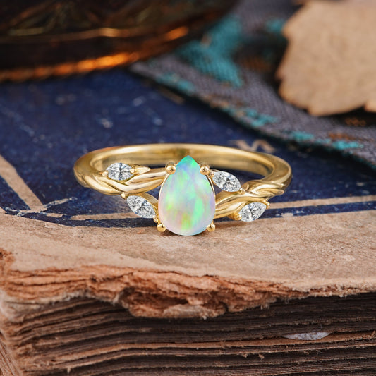 Exquisite 4-Prong Pear Cut Opal Engagement Ring
