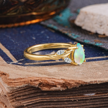 Exquisite 4-Prong Pear Cut Opal Engagement Ring