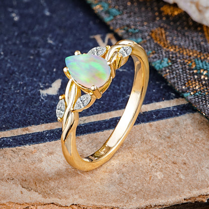 Exquisite 4-Prong Pear Cut Opal Engagement Ring