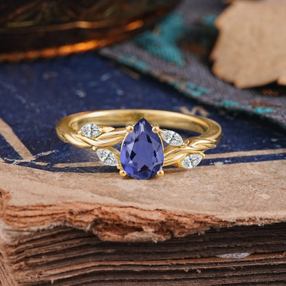 Exquisite 4-Prong Pear Cut Tanzanite Engagement Ring