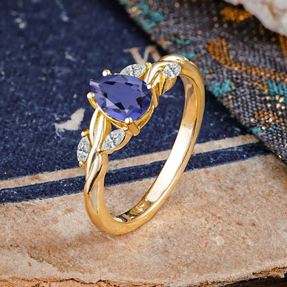 Exquisite 4-Prong Pear Cut Tanzanite Engagement Ring