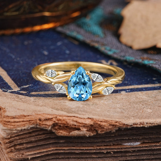 Exquisite 4-Prong Pear Cut Aquamarine Engagement Ring