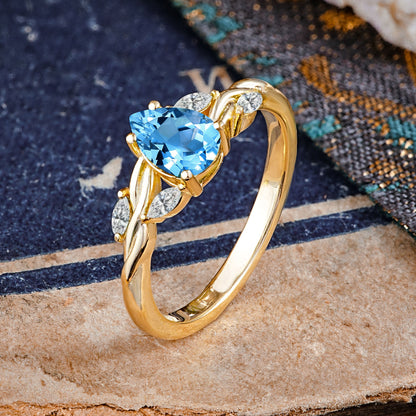 Exquisite 4-Prong Pear Cut Aquamarine Engagement Ring