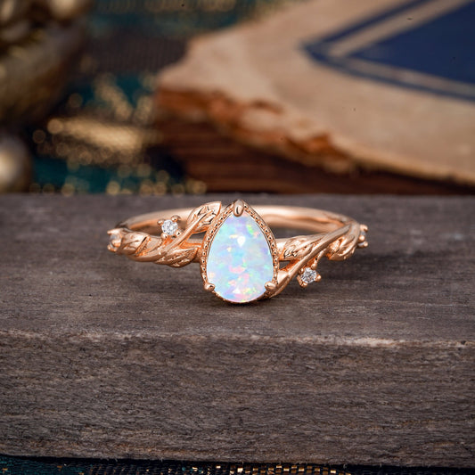 Nature-Inspired 3-Prong Pear-Cut Opal Engagement Ring