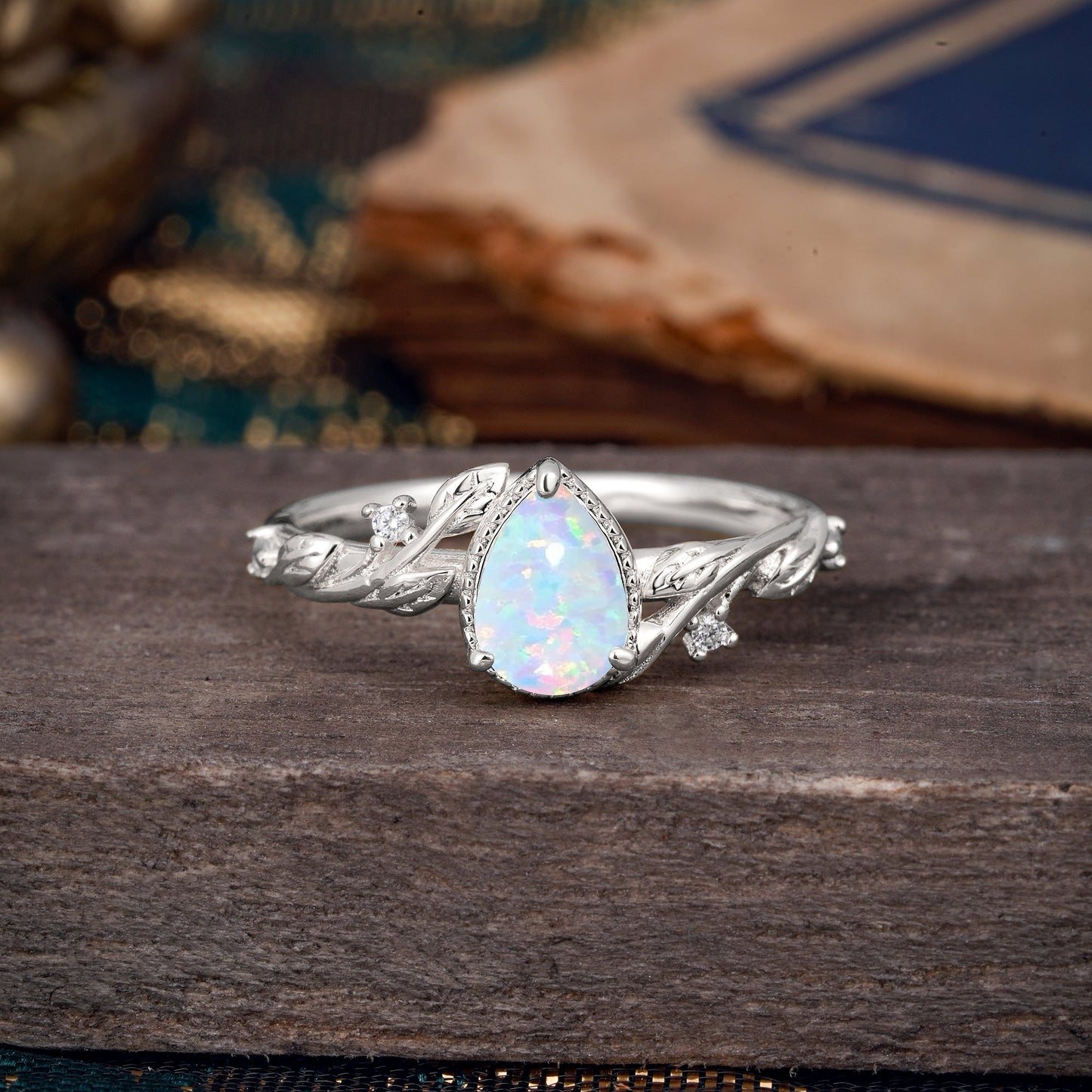 Nature-Inspired 3-Prong Pear-Cut Opal Engagement Ring