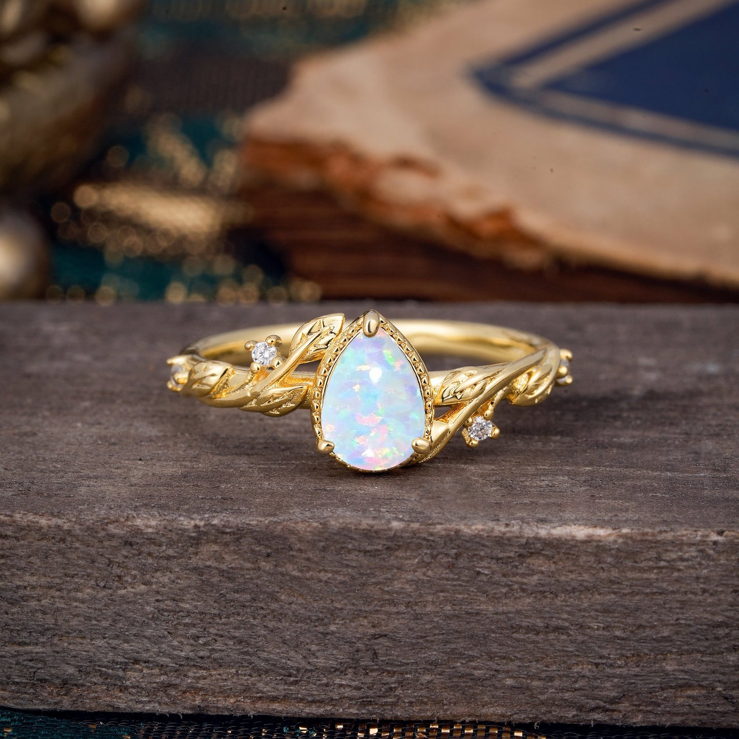 Nature-Inspired 3-Prong Pear-Cut Opal Engagement Ring