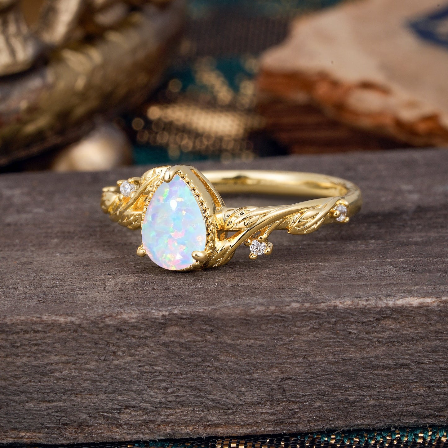 Nature-Inspired 3-Prong Pear-Cut Opal Engagement Ring