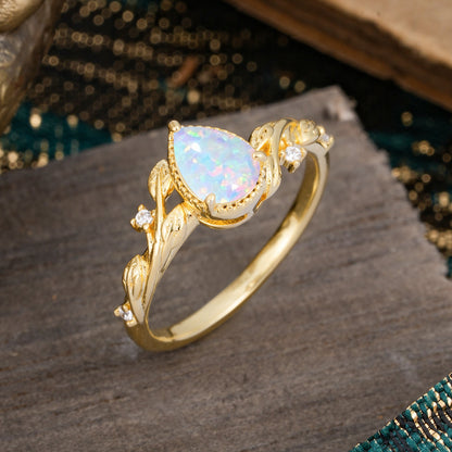 Nature-Inspired 3-Prong Pear-Cut Opal Engagement Ring