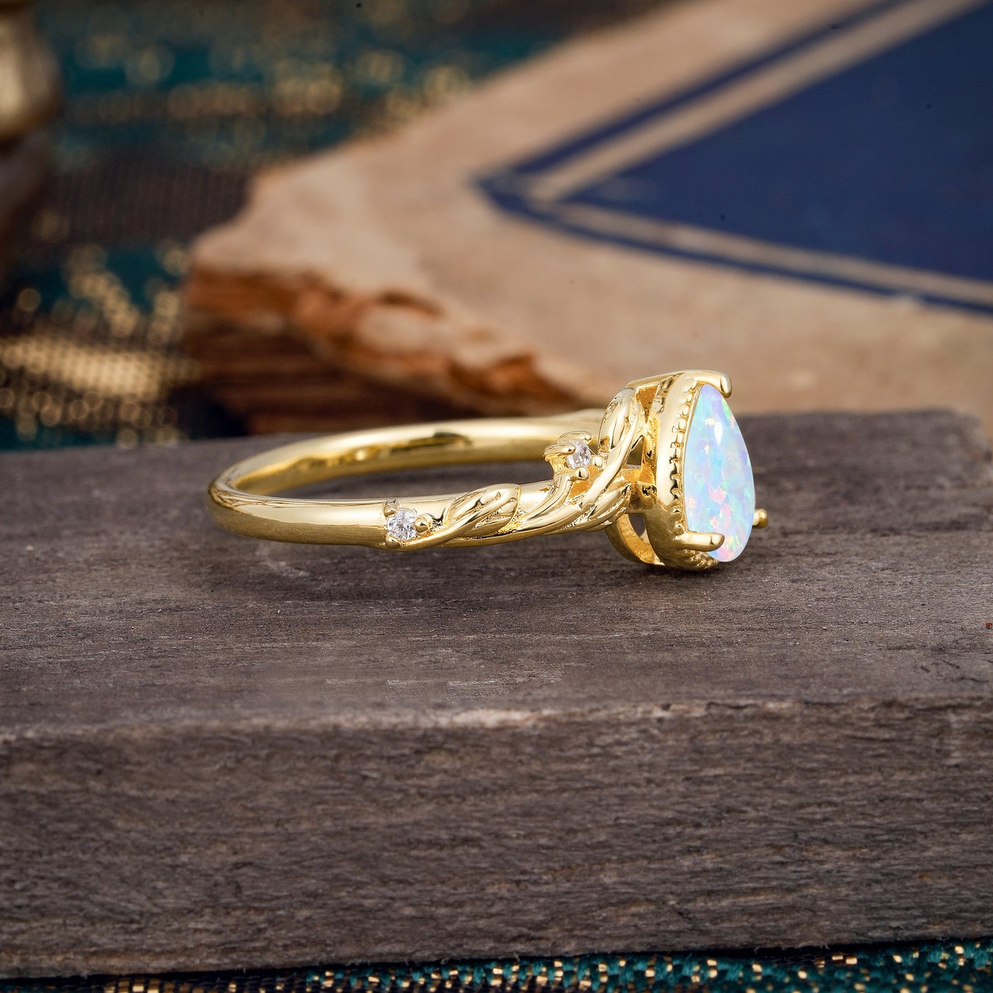 Nature-Inspired 3-Prong Pear-Cut Opal Engagement Ring
