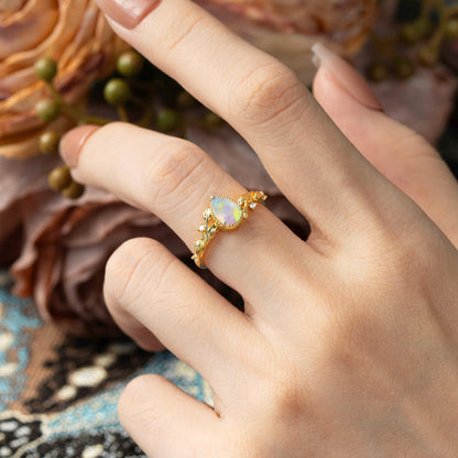 Nature-Inspired 3-Prong Pear-Cut Opal Engagement Ring