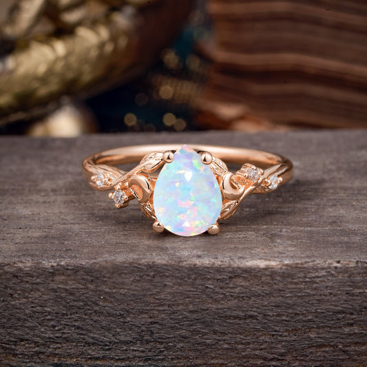 Vintage Minimalist 4-Prong Pear-Cut Opal Engagement Ring