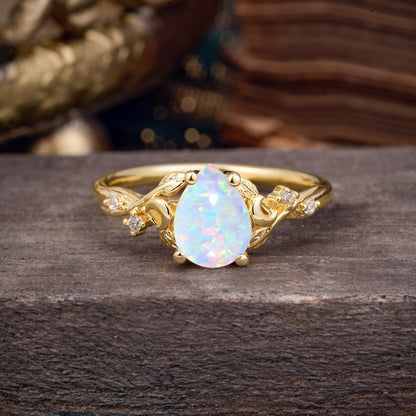 Vintage Minimalist 4-Prong Pear-Cut Opal Engagement Ring