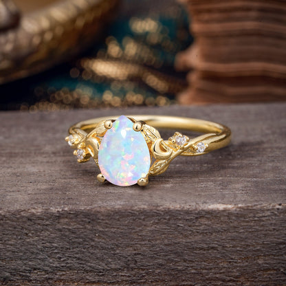 Vintage Minimalist 4-Prong Pear-Cut Opal Engagement Ring