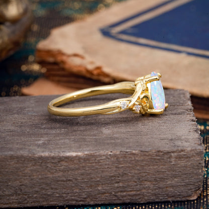Vintage Minimalist 4-Prong Pear-Cut Opal Engagement Ring