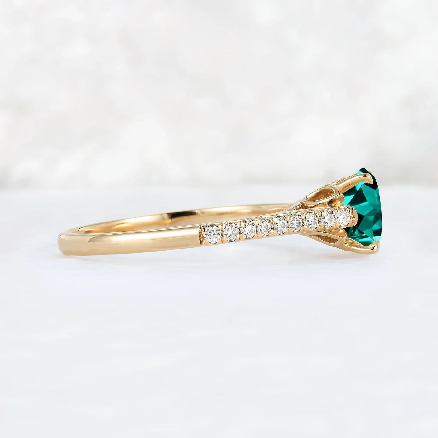Timeless Round Cut Emerald Half Enternity Gemstone Ring