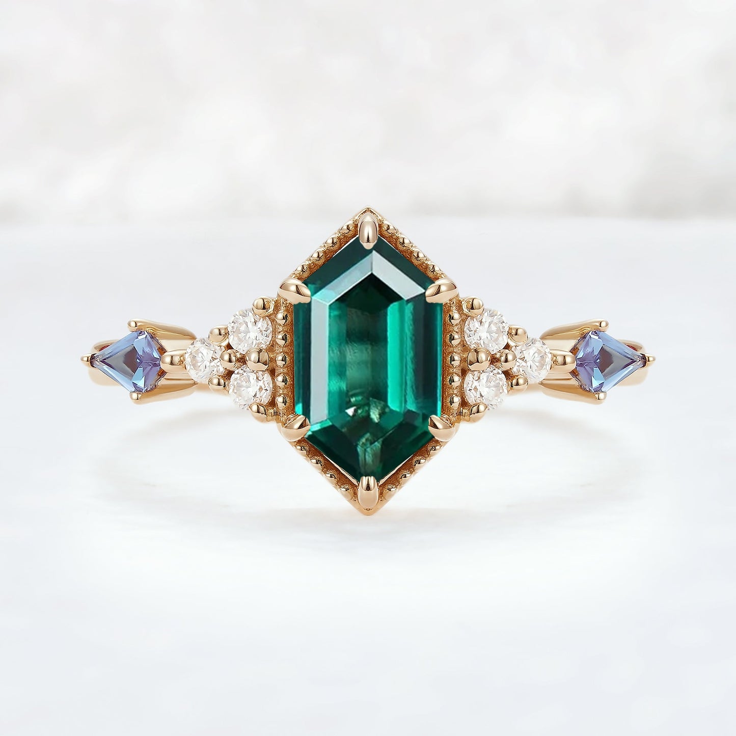 Unique Hexagon Cut Emerald and Moissanite Ring
