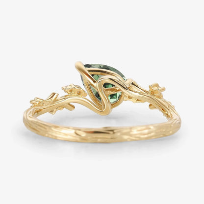 Branch & Leaf Prong Unique Tilted Pear-Cut Teal Sapphire Engagement Ring