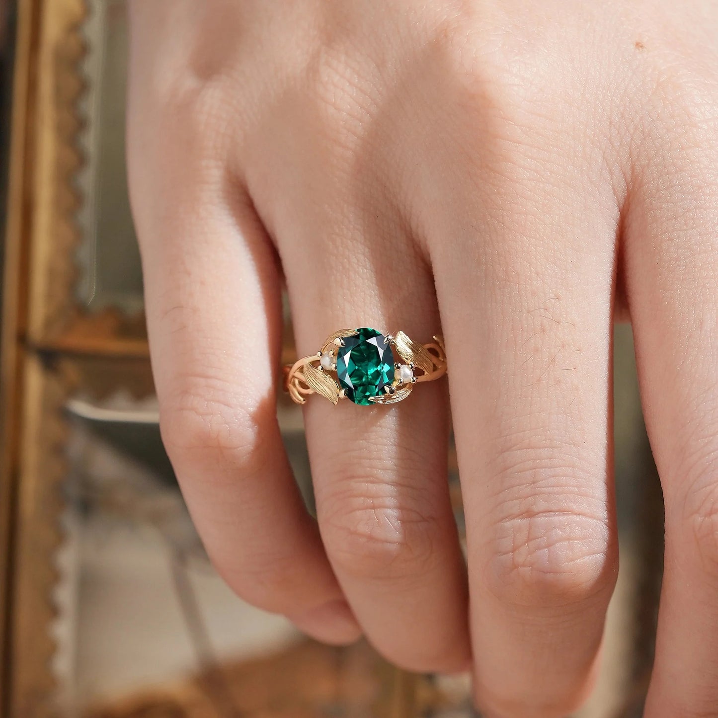 Elegant Oval Cut Emerald Brushed Gold Leaf Ring - Thea