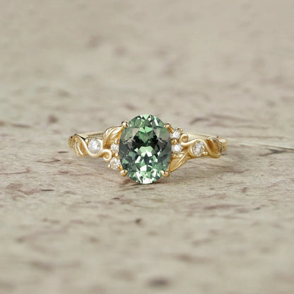 Nature's Embrace: Oval Cut Green Sapphire Leaf Ring - Lila